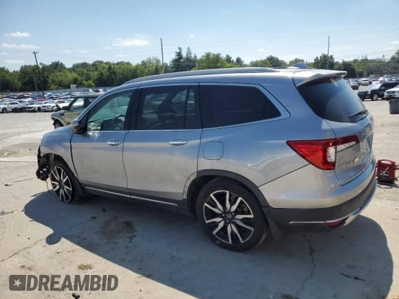 2019 Honda Pilot Touring 8-Passenger z VIN 5FNYF5H98KB007882, wystawiony jako Copart lot #65011685 z przebiegiem 145 649 mil mil oraz Szkoda całkowita • Salvage title. Historia ofert i sprzedaży dostępna na DreamBid. Obrazek 2.