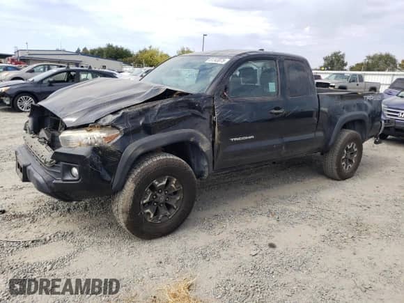 2016 Toyota Tacoma SR5 с VIN 5TFSZ5AN9GX033070, выставлен на аукционе Copart как лот 81343075 с пробегом 83 683 миль миль и Списание • Salvage title. История ставок и продаж доступна на DreamBid. Изображение 1.