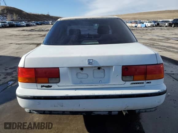 1992 Honda Accord LX с VIN 1HGCB7557NA099309, выставлен на аукционе Copart как лот 46366255 с пробегом 309 805 миль миль и Чистый • Clean title. История ставок и продаж доступна на DreamBid. Изображение 6.