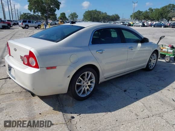 2012 Chevrolet Malibu LTZ z VIN 1G1ZG5E75CF156969, wystawiony jako IAAI lot #42576487 z przebiegiem 107 729 mil mil oraz . Historia ofert i sprzedaży dostępna na DreamBid. Obrazek 4.