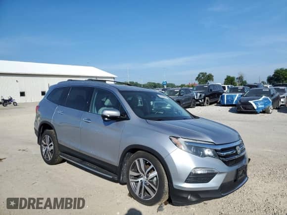 2018 Honda Pilot Touring z VIN 5FNYF6H99JB025070, wystawiony jako Copart lot #64745825 z przebiegiem 81 461 mil mil oraz Szkoda całkowita • Salvage title. Historia ofert i sprzedaży dostępna na DreamBid. Obrazek 4.