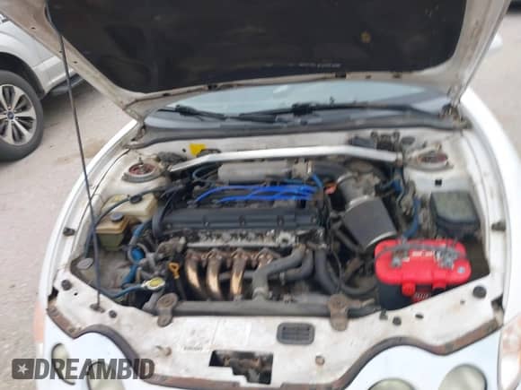 2000 Hyundai Tiburon z VIN KMHJG35F6YU167638, wystawiony jako IAAI lot #42335613 z przebiegiem 254 361 mil mil oraz . Historia ofert i sprzedaży dostępna na DreamBid. Obrazek 10.