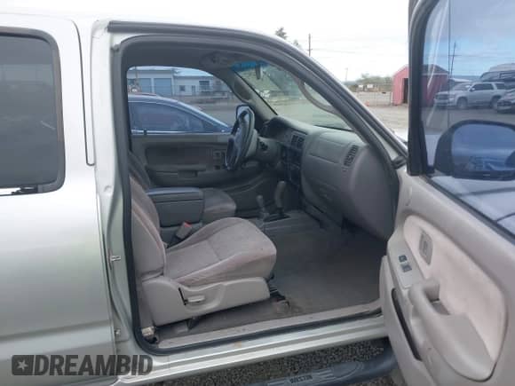 2002 Toyota Tacoma z VIN 5TEHN72N82Z039668, wystawiony jako IAAI lot #43247572 z przebiegiem 241 336 mil mil oraz . Historia ofert i sprzedaży dostępna na DreamBid. Obrazek 5.