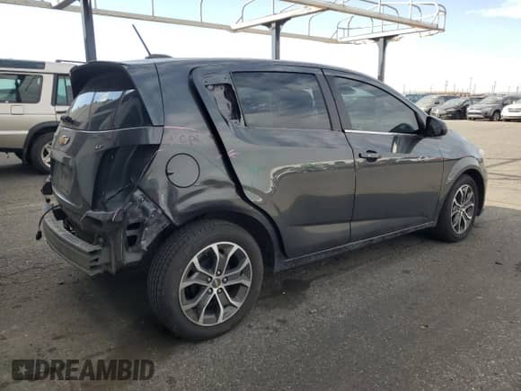 2017 Chevrolet Sonic LT с VIN 1G1JD6SB5H4170927, выставлен на аукционе Copart как лот 85540045 с пробегом 82 806 миль миль и Списание • Salvage title. История ставок и продаж доступна на DreamBid. Изображение 3.