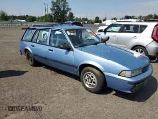 1990 Chevrolet Cavalier z VIN 1G1JC84GXL7192906, wystawiony jako Copart lot #70527855 z przebiegiem 29 672 mil mil oraz Szkoda całkowita • Salvage title. Historia ofert i sprzedaży dostępna na DreamBid. Obrazek 4.