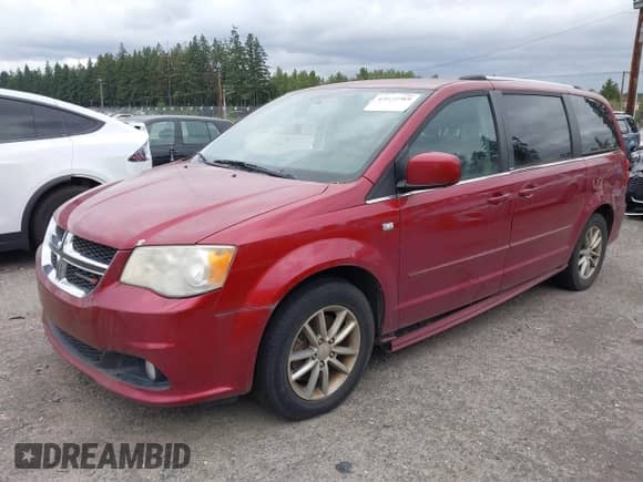 2014 Dodge Grand Caravan SXT with VIN 2C4RDGCG8ER344332, listed as a IAAI auction lot 42941989 with 165,945 mi miles and . Bid and sale history available at DreamBid. Image 2.