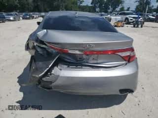 2013 Hyundai Azera с VIN KMHFG4JG6DA224829, выставлен на аукционе Copart как лот 71669555 с пробегом Не указан миль и Списание • Salvage title. История ставок и продаж доступна на DreamBid. Изображение 6.