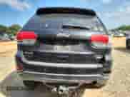 2016 Jeep Grand Cherokee Laredo with VIN 1C4RJFAG2GC489528, listed as a Copart auction lot 80066785 with 138,449 mi miles and Salvage title. Bid and sale history available at DreamBid. Image 6.