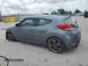 2012 Hyundai Veloster w/Red Int z VIN KMHTC6AD0CU053458, wystawiony jako Copart lot #60790585 z przebiegiem 123 096 mil mil oraz Czysty tytuł • Clean title. Historia ofert i sprzedaży dostępna na DreamBid. Obrazek 2.