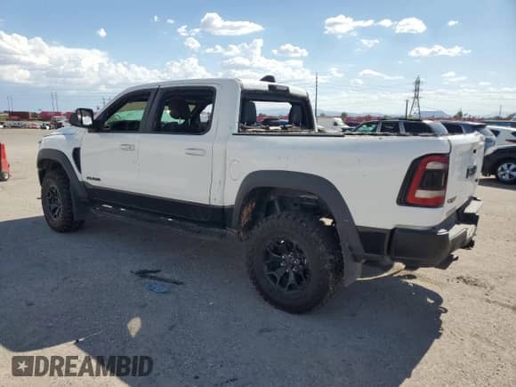 2022 Ram 1500 TRX z VIN 1C6SRFU99NN102201, wystawiony jako Copart lot #69654795 z przebiegiem Nie podano mil oraz Czysty tytuł • Clean title. Historia ofert i sprzedaży dostępna na DreamBid. Obrazek 2.