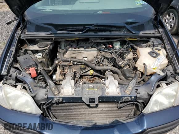 2002 Chevrolet Venture Plus 1SB z VIN 1GNDX03E02D133316, wystawiony jako Copart lot #58948705 z przebiegiem 173 274 mil mil oraz Szkoda całkowita • Salvage title. Historia ofert i sprzedaży dostępna na DreamBid. Obrazek 12.