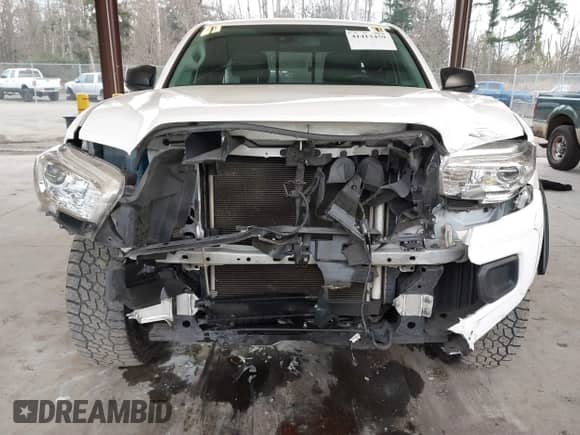2021 Toyota Tacoma SR with VIN 3TYSZ5AN4MT044869, listed as a IAAI auction lot 41413459 with 62,446 mi miles and . Bid and sale history available at DreamBid. Image 6.