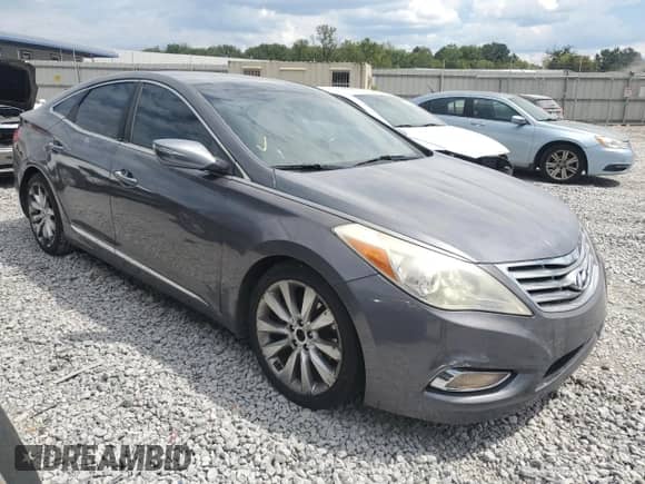 2012 Hyundai Azera с VIN KMHFH4JG7CA014039, выставлен на аукционе Copart как лот 71280805 с пробегом 165 940 миль миль и Чистый • Clean title. История ставок и продаж доступна на DreamBid. Изображение 4.