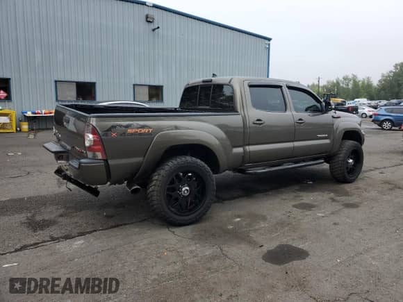 2012 Toyota Tacoma с VIN 3TMMU4FN0CM043738, выставлен на аукционе Copart как лот 81942235 с пробегом 134 867 миль миль и Списание • Salvage title. История ставок и продаж доступна на DreamBid. Изображение 3.