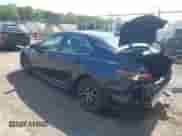 2021 Toyota Camry SE Nightshade z VIN 4T1G11AKXMU523439, wystawiony jako IAAI lot #43122074 z przebiegiem 66 261 mil mil oraz . Historia ofert i sprzedaży dostępna na DreamBid. Obrazek 3.