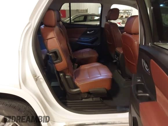 2021 Chevrolet Traverse High Country z VIN 1GNEVNKW0MJ199645, wystawiony jako IAAI lot #43042984 z przebiegiem 106 593 mil mil oraz . Historia ofert i sprzedaży dostępna na DreamBid. Obrazek 8.