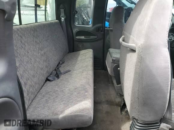 1998 Dodge 1500 z VIN 3B7HC13Y1WG184693, wystawiony jako Copart lot #52044345 z przebiegiem 137 277 mil mil oraz Szkoda całkowita • Salvage title. Historia ofert i sprzedaży dostępna na DreamBid. Obrazek 10.