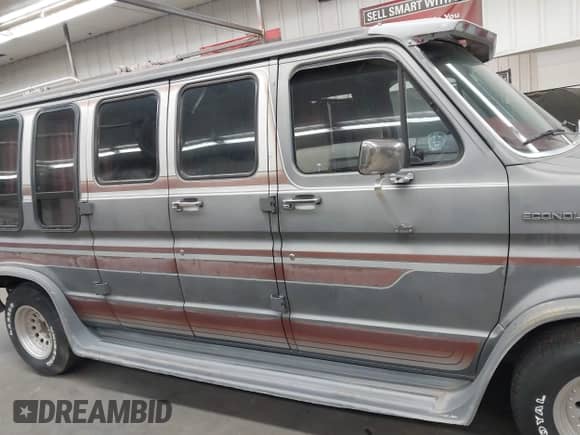 1987 Ford Econoline Cargo с VIN 1FDDE14N7HHB07179, выставлен на аукционе IAAI как лот 42801871 с пробегом 99 835 миль миль и . История ставок и продаж доступна на DreamBid. Изображение 13.