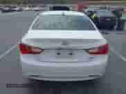 2013 Hyundai Sonata SE with VIN 5NPEC4AC0DH729220, listed as a IAAI auction lot 43095272 with 116,829 mi miles and . Bid and sale history available at DreamBid. Image 16.