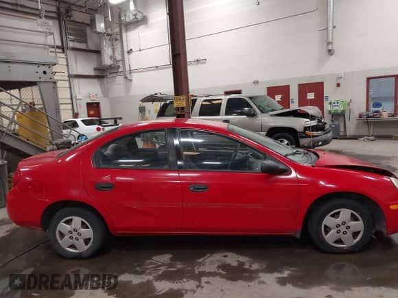 2003 Dodge Neon SE with VIN 1B3ES26C53D153680, listed as a IAAI auction lot 42637739 with 240,730 mi miles and . Bid and sale history available at DreamBid. Image 14.