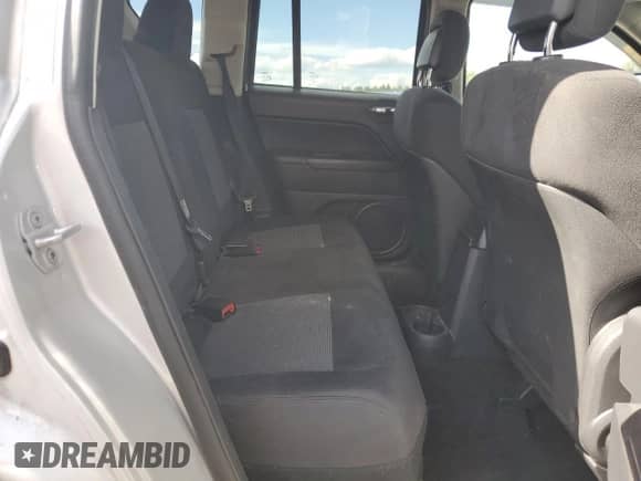 2011 Jeep Compass z VIN 1J4NF1FB1BD280813, wystawiony jako Copart lot #69636485 z przebiegiem 119 032 mil mil oraz Szkoda całkowita • Salvage title. Historia ofert i sprzedaży dostępna na DreamBid. Obrazek 11.