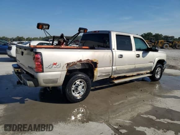 2005 Chevrolet Silverado 1500HD LS с VIN 1GCGK13U75F878641, выставлен на аукционе Copart как лот 70034645 с пробегом 184 344 миль миль и Списание • Salvage title. История ставок и продаж доступна на DreamBid. Изображение 3.