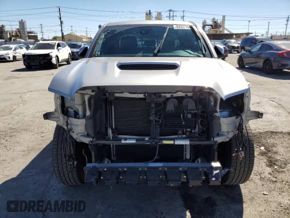 2019 Toyota Tacoma SR5 with VIN 3TMAZ5CNXKM082110, listed as a Copart auction lot 82571635 with 74,962 mi miles and Salvage title. Bid and sale history available at DreamBid. Image 5.