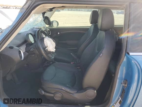 2013 MINI Hardtop with VIN WMWSU3C58DT683072, listed as a Copart auction lot 47483085 with 122,284 mi miles and Salvage title. Bid and sale history available at DreamBid. Image 7.