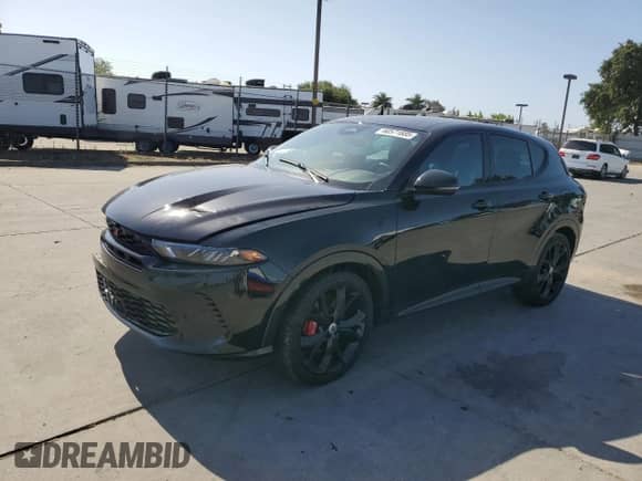 2024 Dodge Hornet R/T Plus with VIN ZACPDFDW3R3A14784, listed as a Copart auction lot 60571685 with 5,892 mi miles and Salvage title. Bid and sale history available at DreamBid. Image 1.