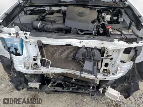 2022 Toyota Tacoma SR5 with VIN 3TYDZ5BN9NT013836, listed as a Copart auction lot 84573435 with 89,105 mi miles and Salvage title. Bid and sale history available at DreamBid. Image 11.
