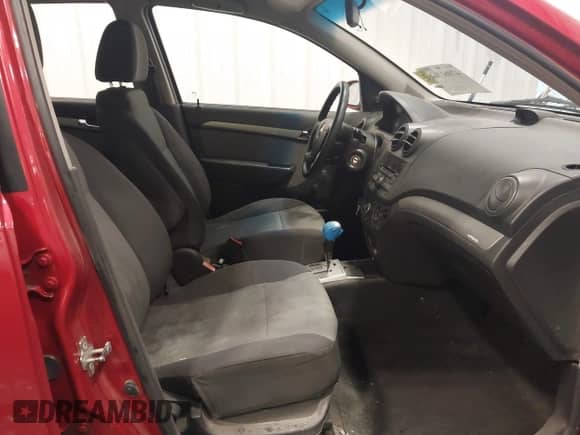 2009 Chevrolet Aveo 1LT z VIN KL1TD66E89B615900, wystawiony jako IAAI lot #42061164 z przebiegiem 117 724 mil mil oraz . Historia ofert i sprzedaży dostępna na DreamBid. Obrazek 5.
