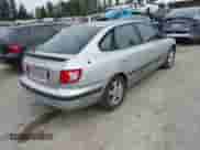 2004 Hyundai Elantra GT z VIN KMHDN56D34U104065, wystawiony jako IAAI lot #42773027 z przebiegiem 161 989 mil mil oraz . Historia ofert i sprzedaży dostępna na DreamBid. Obrazek 4.