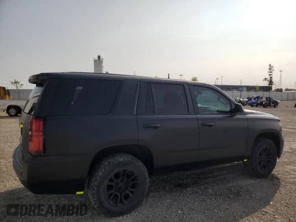 2015 Chevrolet Tahoe Commercial z VIN 1GNLC2EC2FR279529, wystawiony jako Copart lot #80134625 z przebiegiem 141 930 mil mil oraz Czysty tytuł • Clean title. Historia ofert i sprzedaży dostępna na DreamBid. Obrazek 3.