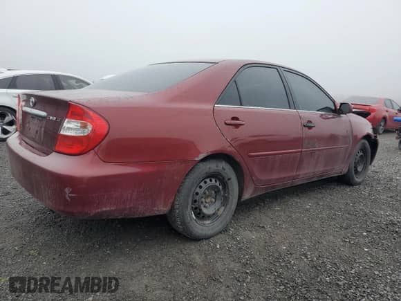 2004 Toyota Camry LE with VIN 4T1BE32K84U322888, listed as a Copart auction lot 82067495 with 240,338 mi miles and Clean title. Bid and sale history available at DreamBid. Image 3.