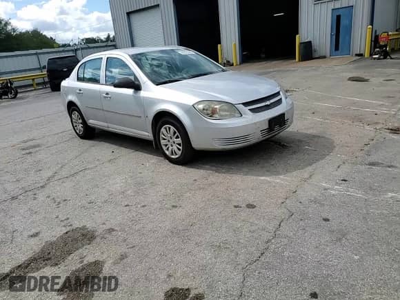 2009 Chevrolet Cobalt LS z VIN 1G1AS58H697158555, wystawiony jako Copart lot #82312565 z przebiegiem Nie podano mil oraz Szkoda całkowita • Salvage title. Historia ofert i sprzedaży dostępna na DreamBid. Obrazek 13.