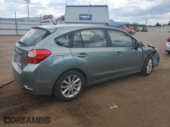 2014 Subaru Impreza Premium with VIN JF1GPAC61E8262852, listed as a Copart auction lot 64561605 with 155,578 mi miles and Salvage title. Bid and sale history available at DreamBid. Image 3.