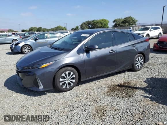 2020 Toyota Prius LE z VIN JTDKARFP7L3134814, wystawiony jako Copart lot #84899765 z przebiegiem 16 798 mil mil oraz Szkoda całkowita • Salvage title. Historia ofert i sprzedaży dostępna na DreamBid. Obrazek 1.