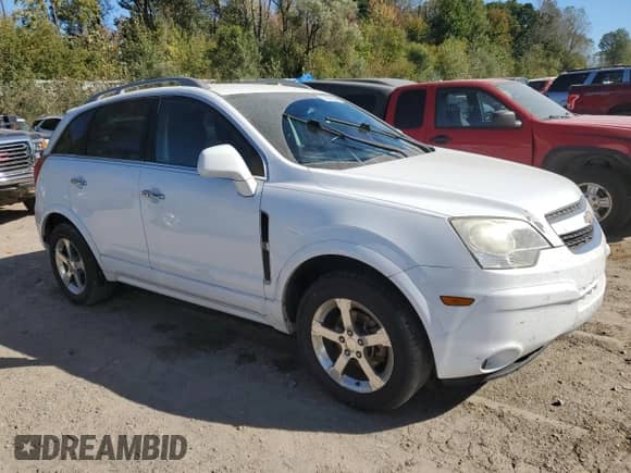 2014 Chevrolet Captiva Sport LT with VIN 3GNAL3EK3ES512592, listed as a Copart auction lot 73379544 with 122,632 mi miles and Clean title. Bid and sale history available at DreamBid. Image 4.