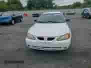 2001 Pontiac Grand Am SE1 с VIN 1G2NF52T41C177549, выставлен на аукционе Copart как лот 70991305 с пробегом 137 770 миль миль и Списание • Salvage title. История ставок и продаж доступна на DreamBid. Изображение 13.
