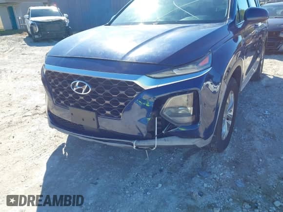 2019 Hyundai Santa Fe SE z VIN 5NMS23AD5KH022696, wystawiony jako IAAI lot #43461873 z przebiegiem 171 227 mil mil oraz . Historia ofert i sprzedaży dostępna na DreamBid. Obrazek 6.