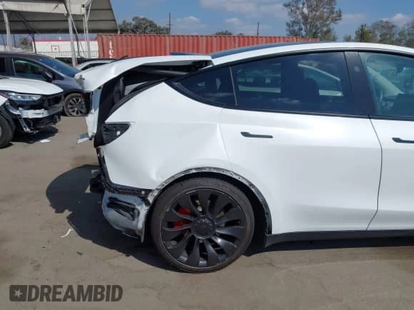 2023 Tesla Model Y Performance with VIN 7SAYGDEF6PF807723, listed as a IAAI auction lot 43209294 with 48,943 mi miles and . Bid and sale history available at DreamBid. Image 6.