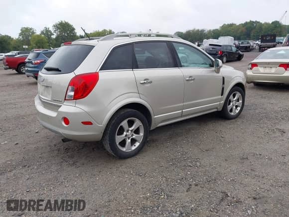 2014 Chevrolet Captiva Sport LTZ с VIN 3GNAL4EK7ES527442, выставлен на аукционе IAAI как лот 43307318 с пробегом 127 759 миль миль и . История ставок и продаж доступна на DreamBid. Изображение 4.