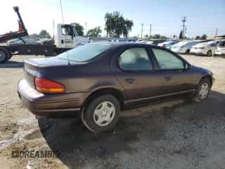 1997 Dodge Stratus с VIN 1B3EJ46X5VN540079, выставлен на аукционе Copart как лот 73252534 с пробегом Не указан миль и Чистый • Clean title. История ставок и продаж доступна на DreamBid. Изображение 3.