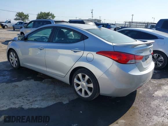 2013 Hyundai Elantra GLS with VIN 5NPDH4AE0DH411676, listed as a IAAI auction lot 42966995 with 59,074 mi miles and . Bid and sale history available at DreamBid. Image 3.