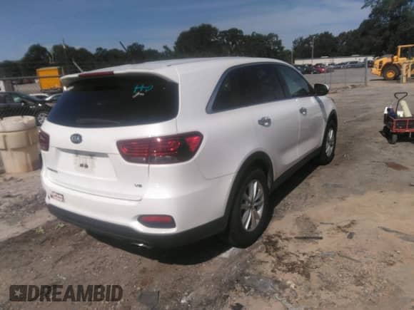2019 Kia Sorento LX with VIN 5XYPG4A5XKG551092, listed as a IAAI auction lot 43081820 with 119,891 mi miles and . Bid and sale history available at DreamBid. Image 4.