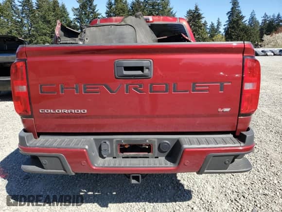 2021 Chevrolet Colorado 4WD Z71 with VIN 1GCGTDEN0M1259671, listed as a Copart auction lot 53388675 with 61,556 mi miles and Salvage title. Bid and sale history available at DreamBid. Image 6.