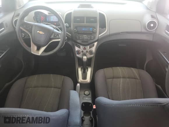 2014 Chevrolet Sonic LT с VIN 1G1JC6SB2E4157907, выставлен на аукционе Copart как лот 65535675 с пробегом 84 479 миль миль и Списание • Salvage title. История ставок и продаж доступна на DreamBid. Изображение 8.