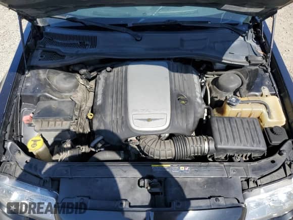 2005 Chrysler 300 C with VIN 2C3AA63H25H150558, listed as a Copart auction lot 81831055 with 128,748 mi miles and Salvage title. Bid and sale history available at DreamBid. Image 11.