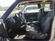 2011 MINI Hardtop S with VIN WMWSV3C50BTY15977, listed as a Copart auction lot 52802295 with 89,085 mi miles and Salvage title. Bid and sale history available at DreamBid. Image 7.