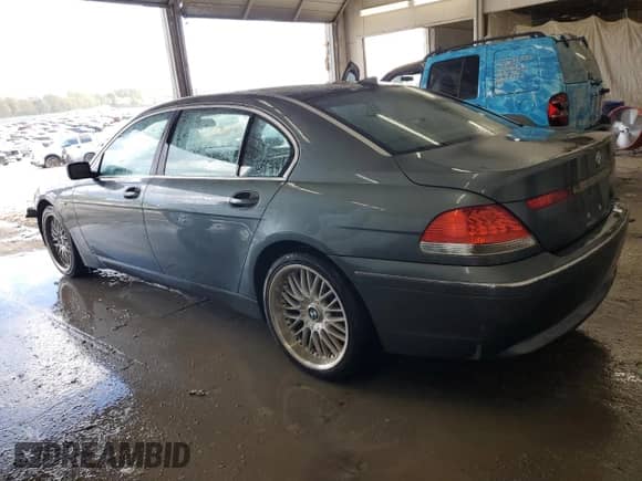 2002 BMW 7 Series 745Li with VIN WBAGN63472DR04910, listed as a Copart auction lot 84754005 with 140,016 mi miles and Salvage title. Bid and sale history available at DreamBid. Image 2.